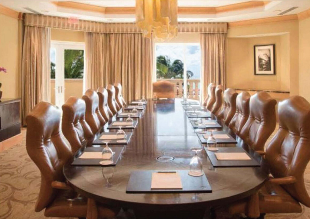Acqualina Boardroom meeting room set with executive chairs