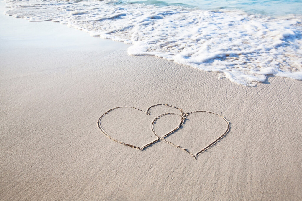 Generic image of hearts on the beach