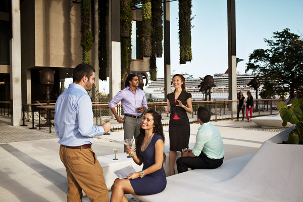 A group of friends having drinks at Perez Art Museum Miami